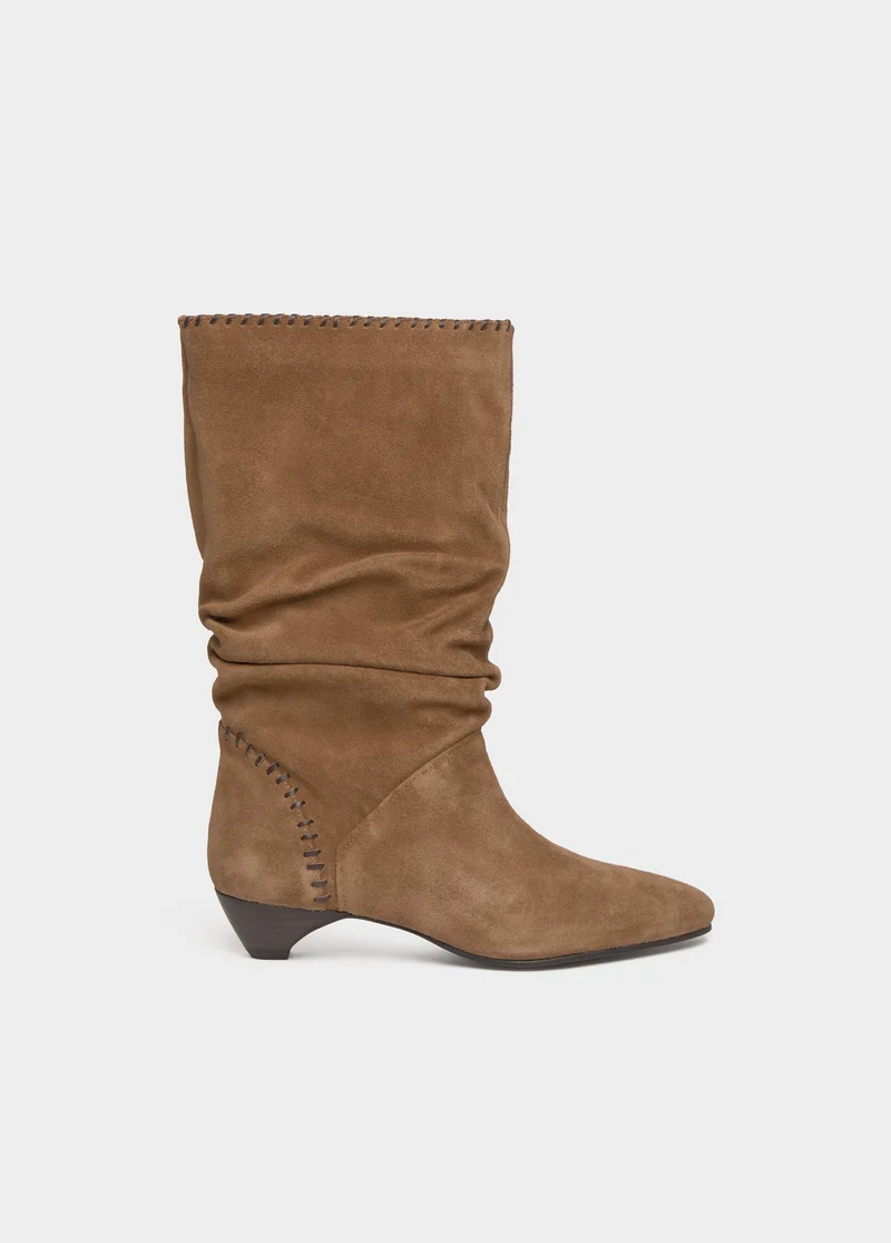 Slouchy boots with kitten heel