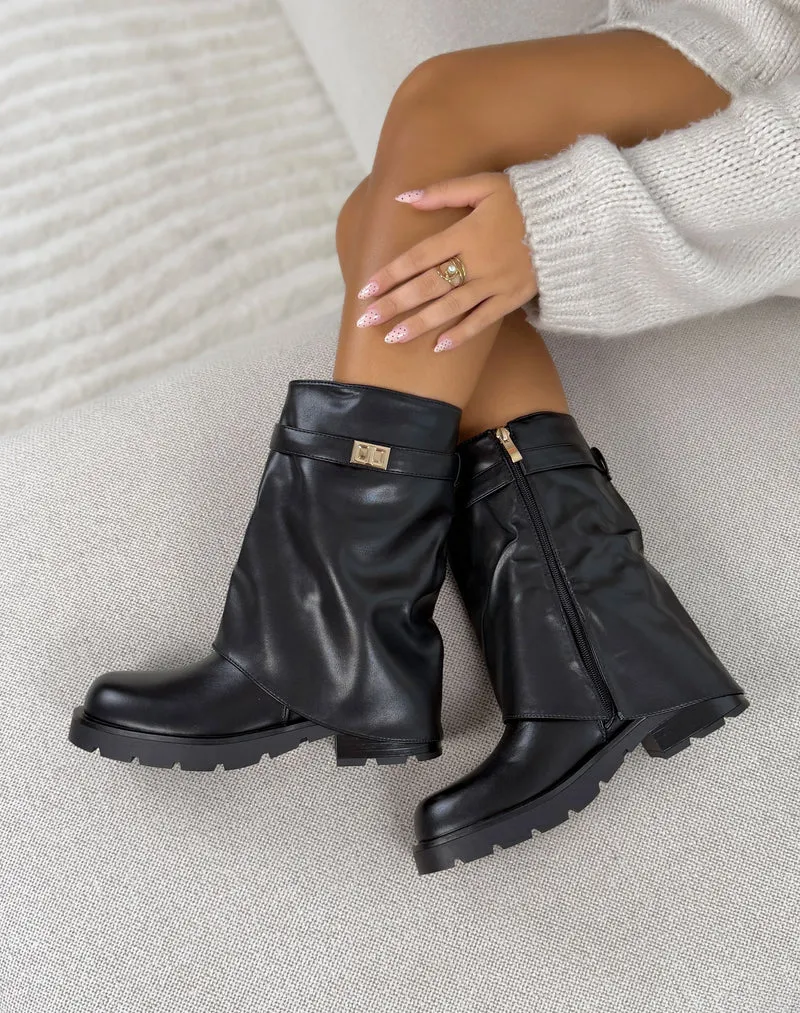 Bottines femme noires tendance à revers avec bijou doré et semelle crantée