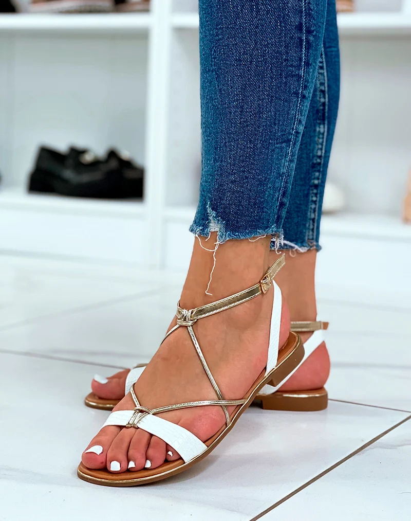 Nu-pieds blancs et dorés