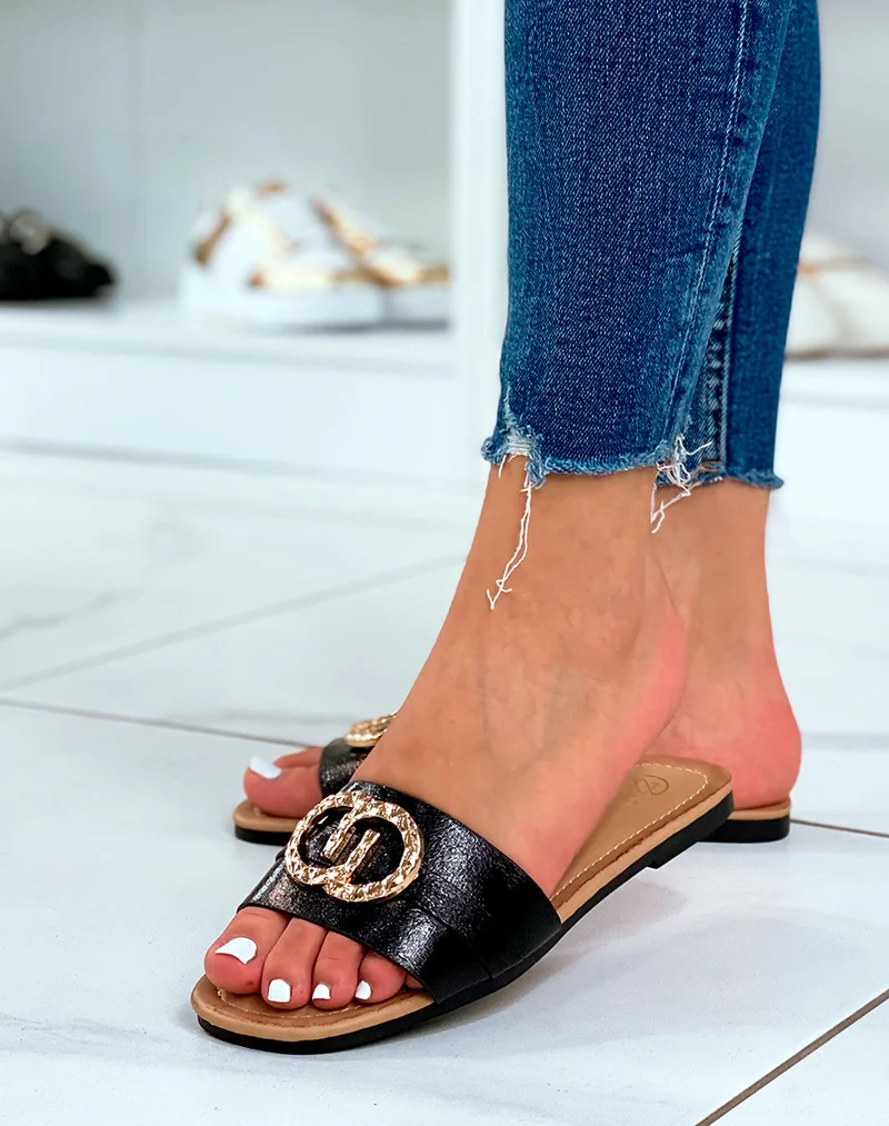 Mules plates noires à double boucle dorée
