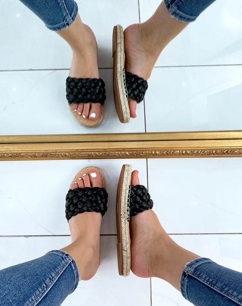 Mules noires tressées à semelle en jute