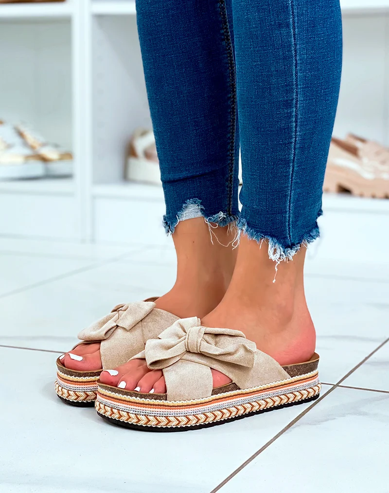 Mules à plateforme en suédine beige à gros noeud