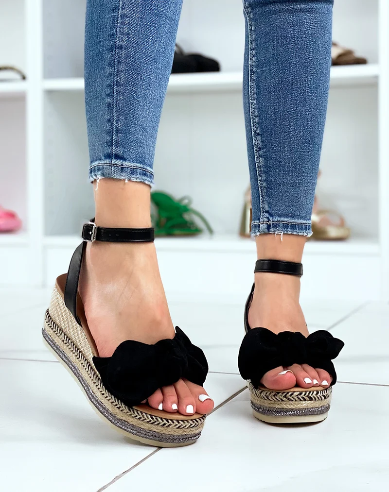 Sandales compensées à noeud en suédine noire et talon en toile de jute coloré