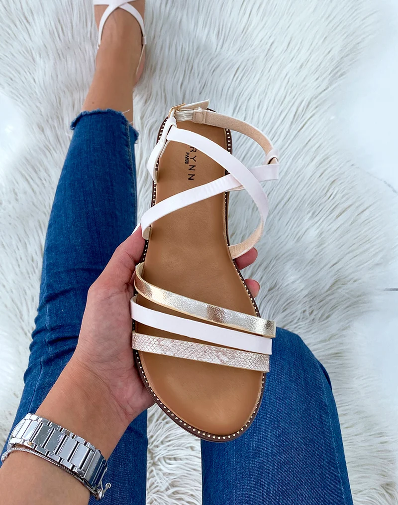 Nu-pieds beige à multiples brides et motif animalier