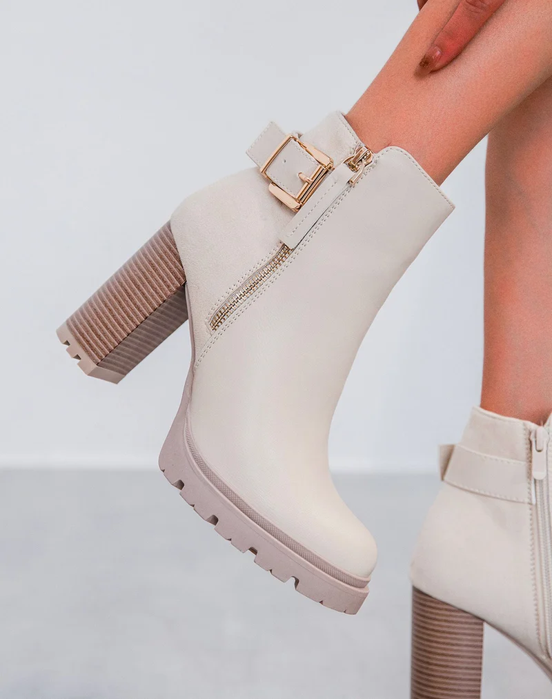 Bottines beiges bi-matières à talons crantés avec sangle