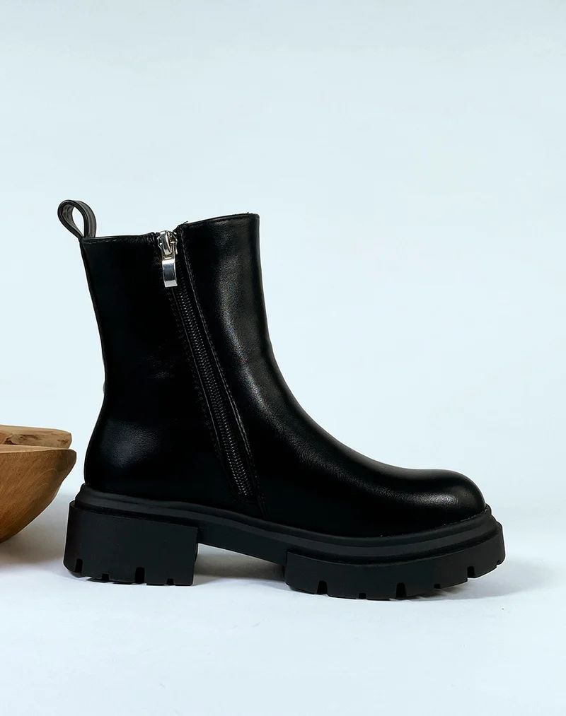 Bottines noires style chelsea boots à élastique et fermeture éclaire