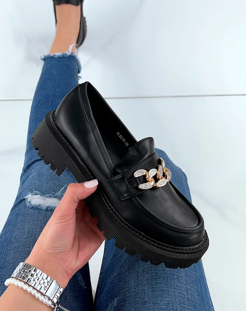 Mocassins noirs à chaîne dorée à strass et semelle crantée