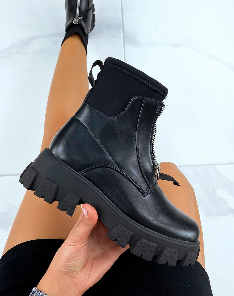 Bottines noires à semelle épaisse crantée