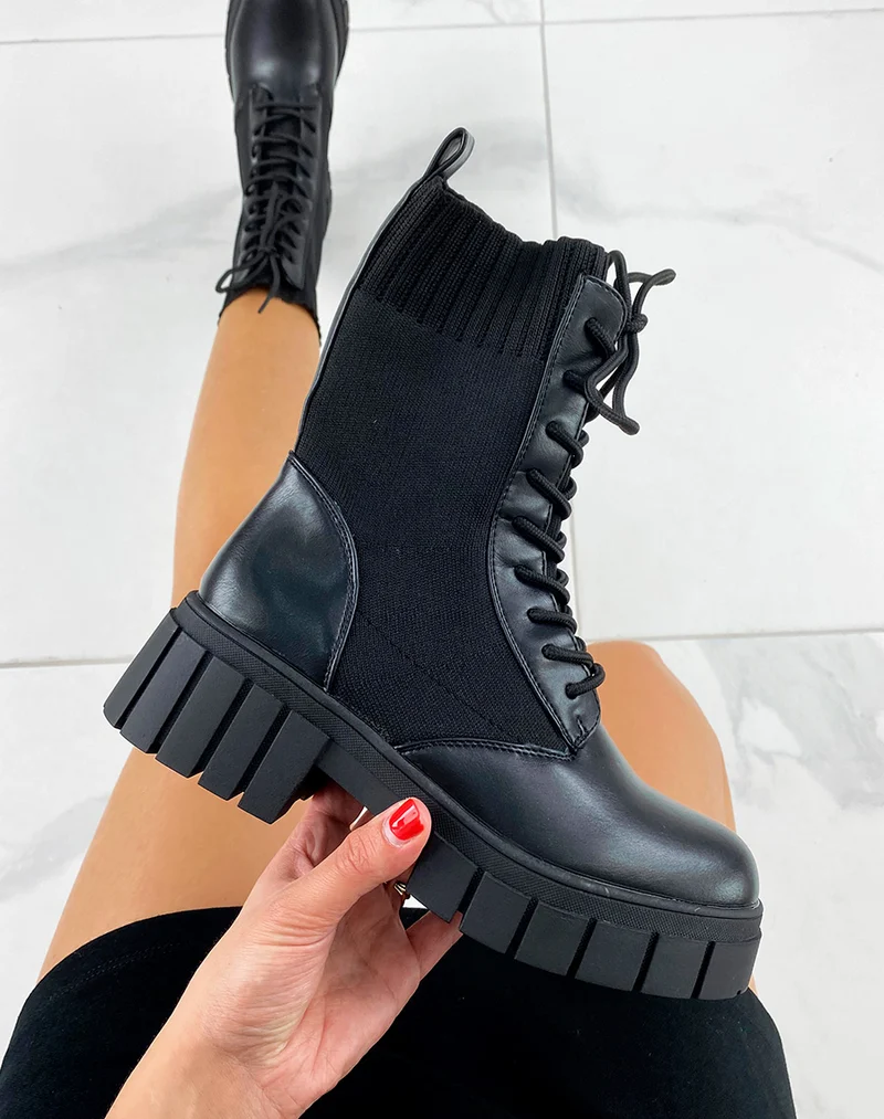 Bottines noires montantes effet chaussette à semelle talonnée