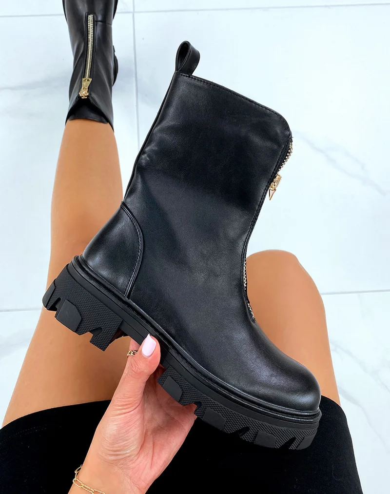 Bottines hautes noires à fermeture dorée