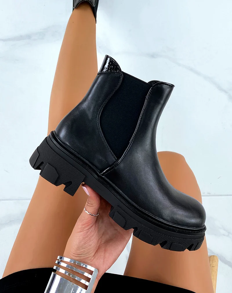 Bottines noires inspiration chelsea à semelle talonnée et crantée