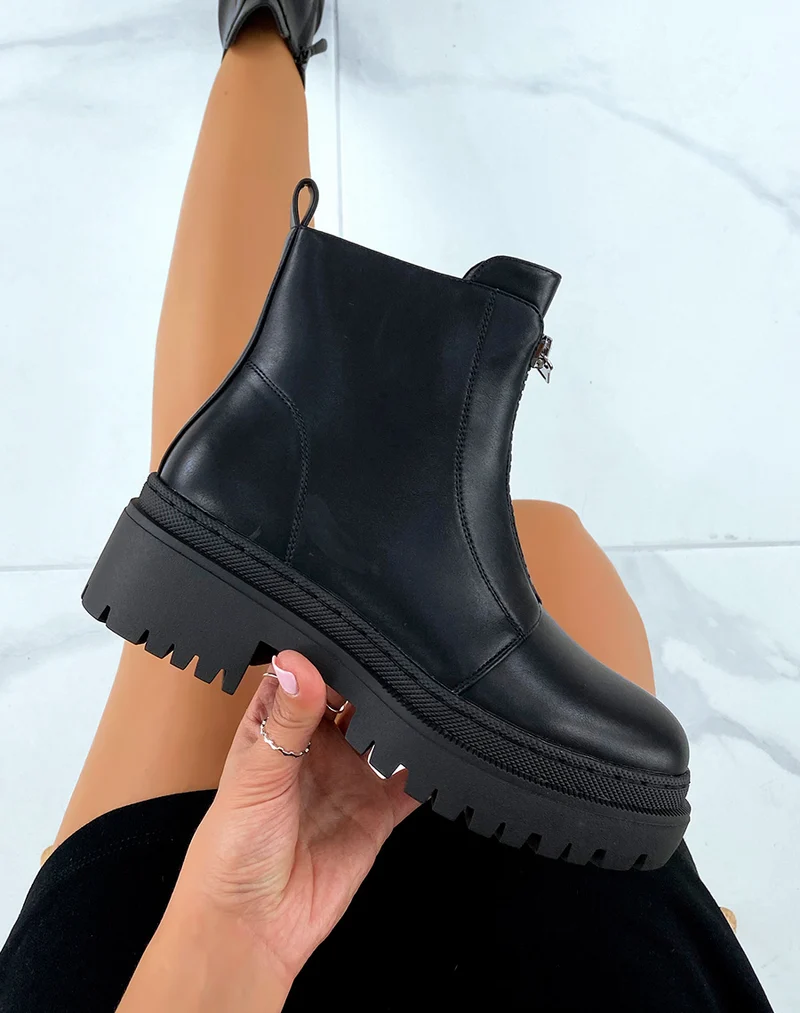 Bottines noires montantes zipées à petit talon