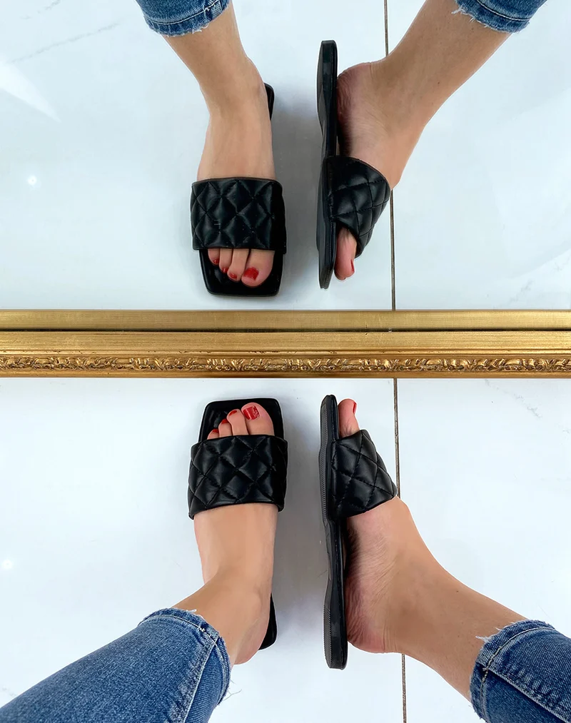 Mules plates noires matelassées