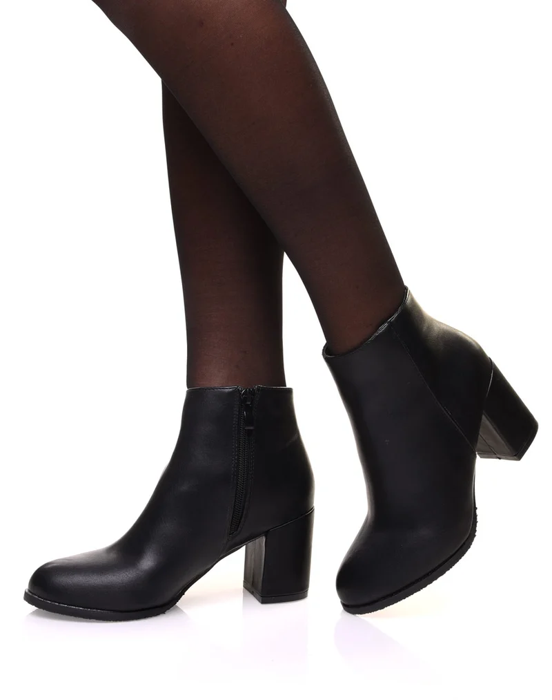 Bottines noires minimalistes à talons mi haut