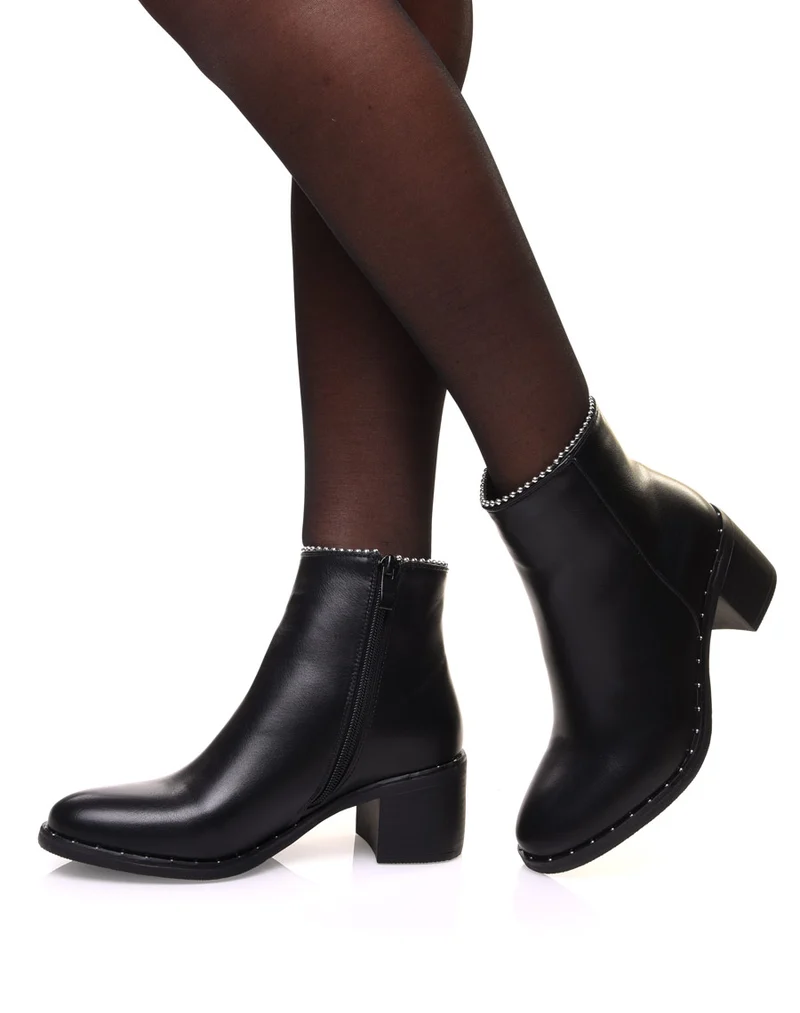 Bottines noires à semelle cloutée et haut perlé