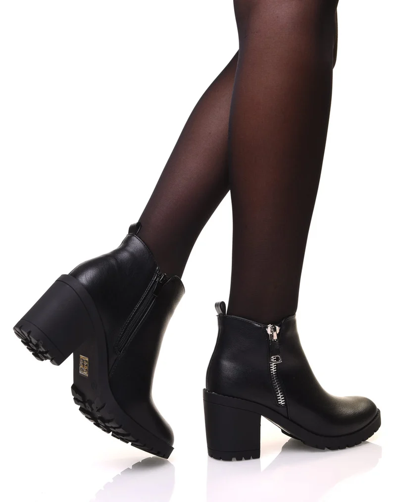 Bottines noires à talons et semelle crantée