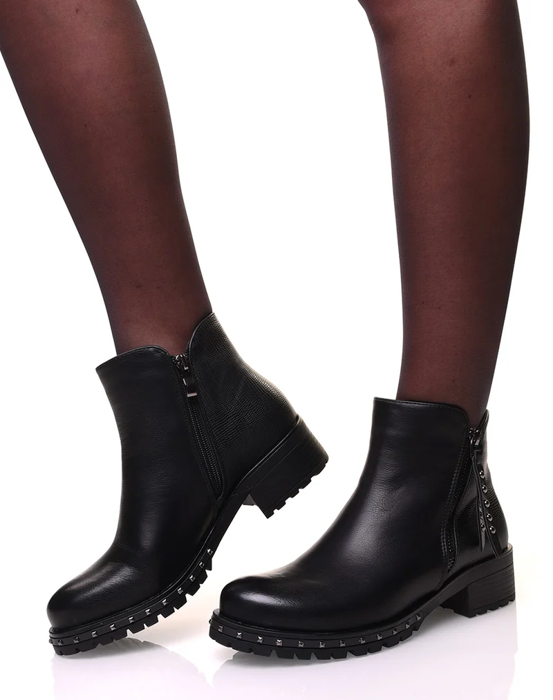 Bottines à fermetures éclaires décoratives et semelles cloutées