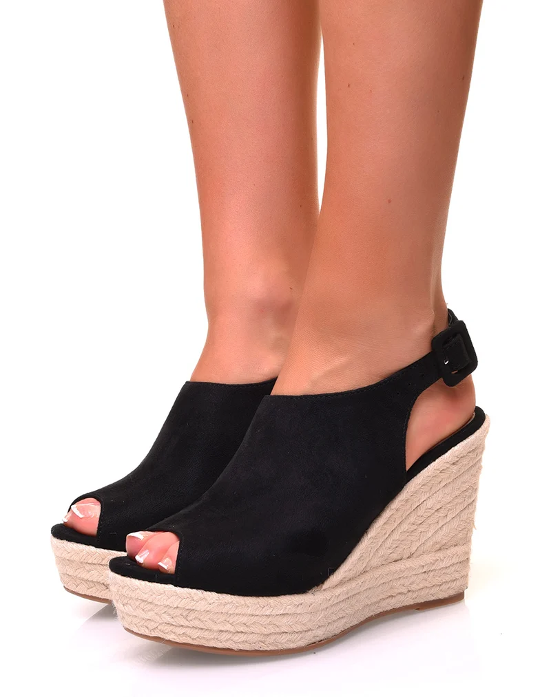 Sandales en suédine noire ajourées à l’avant et à talons compensés