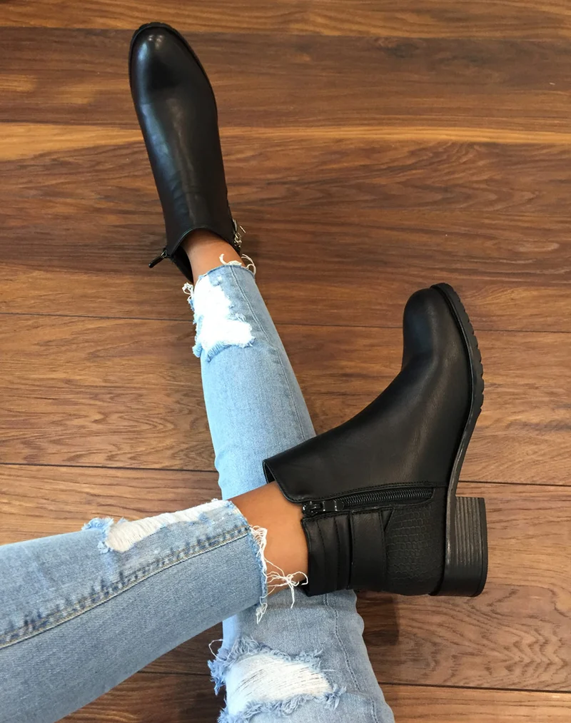 Bottines noires bi matières à motifs python