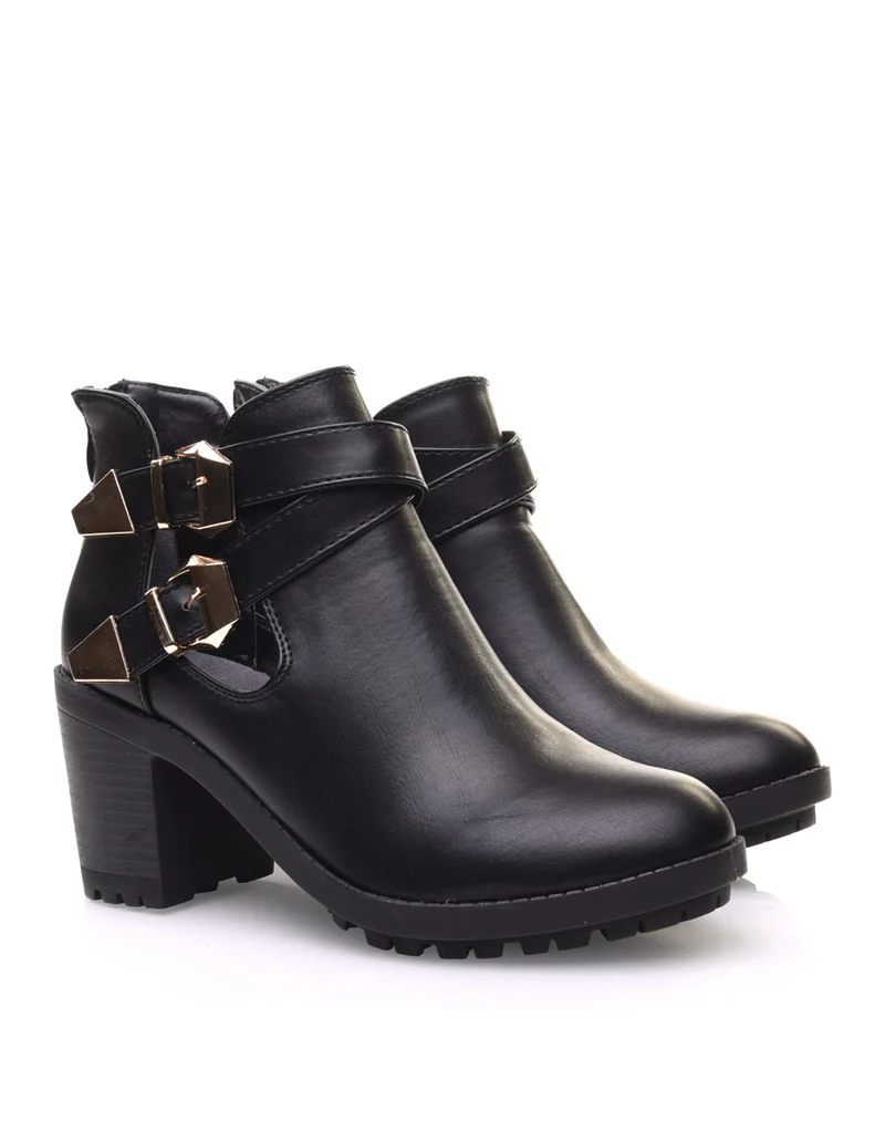 Bottines noires crantées à boucles croisées