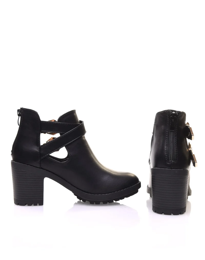 Bottines noires crantées à boucles croisées