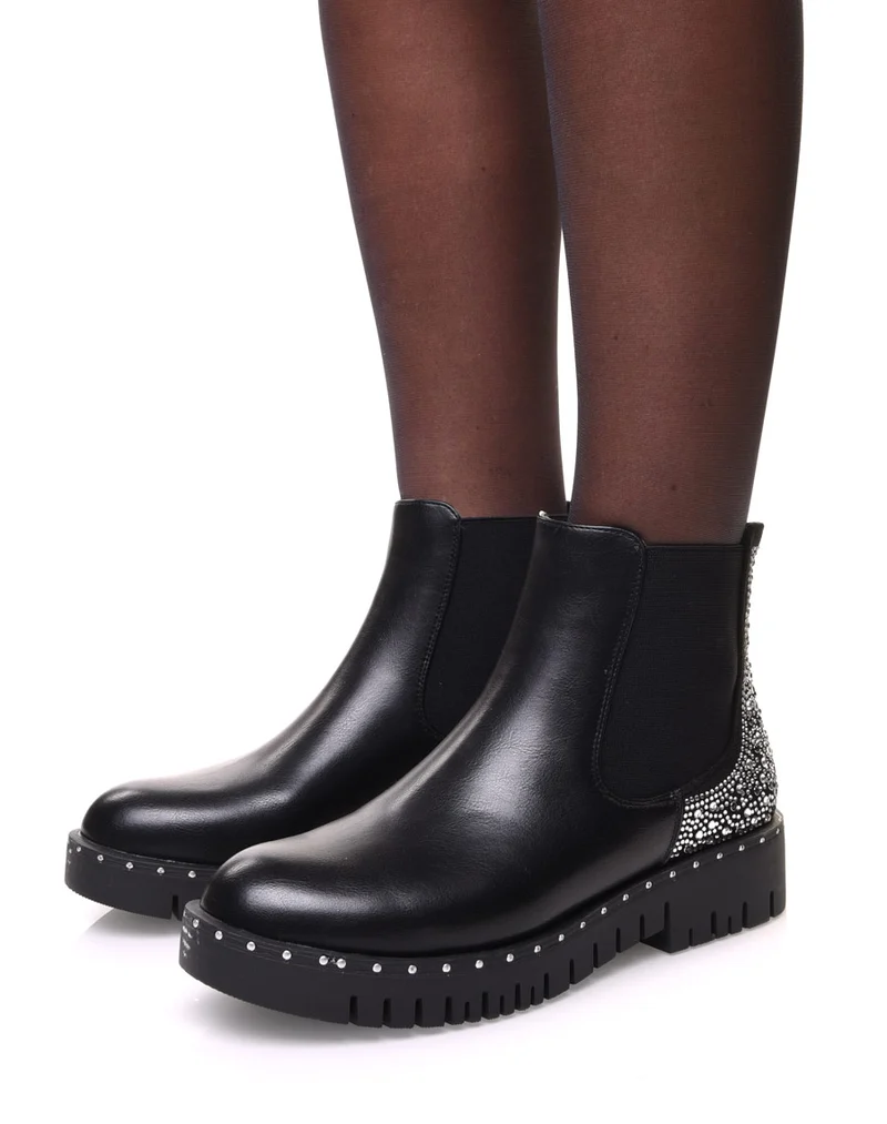 Chelsea boots noires avec détails strass à l’arrière