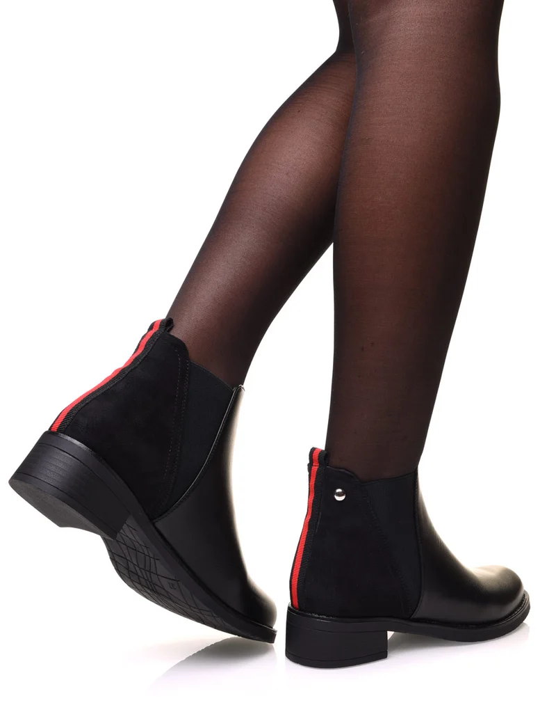Bottines noires avec élastique bicolore à l’arrière
