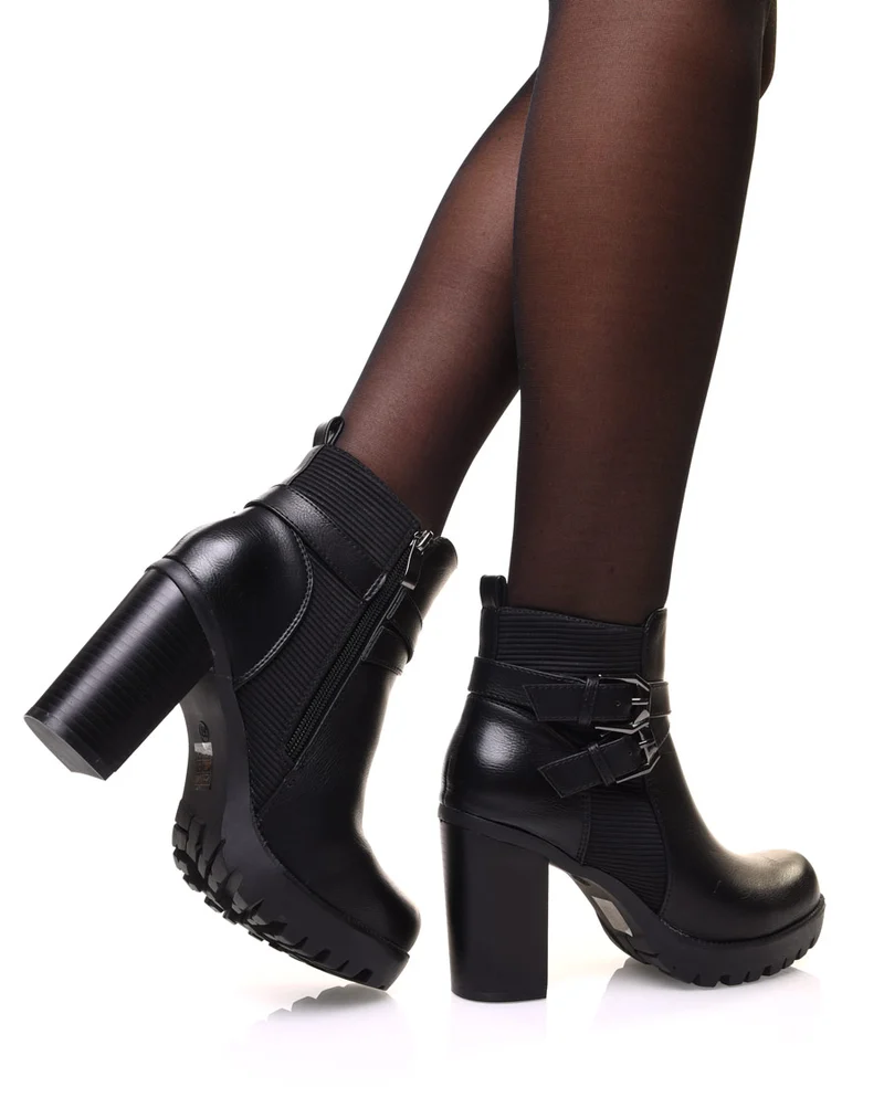 Bottines noires bi matières à talon et sangles entrelacées