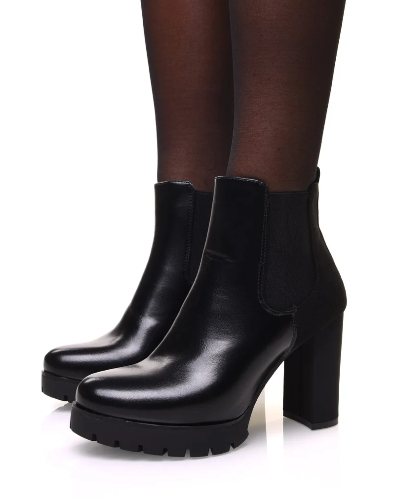 Chelsea boots noires bi matières à talons et plateforme crantée