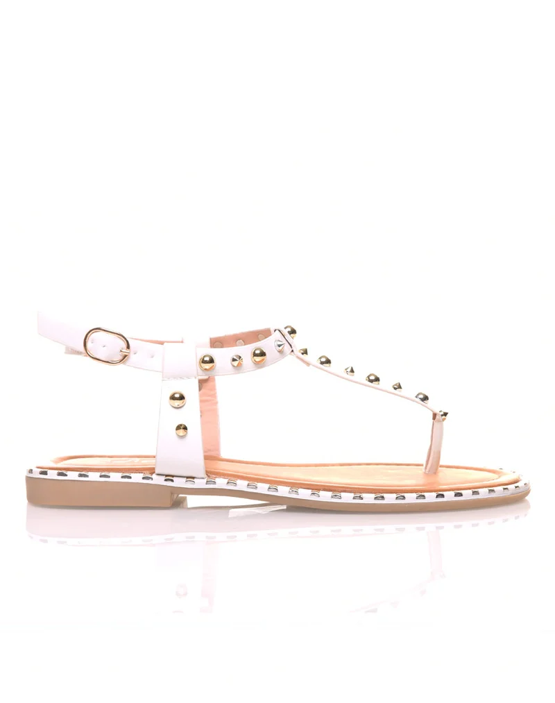 Nu pieds blancs cloutés or