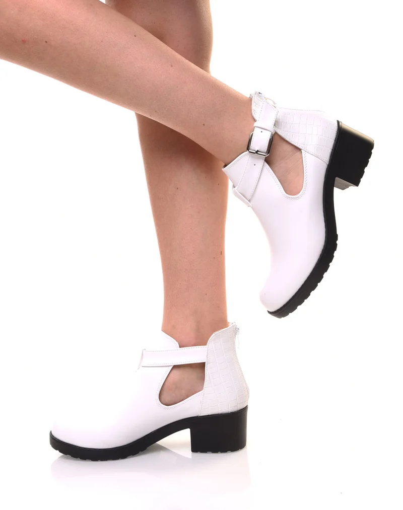 Bottines blanches ajourées à petit talon et boucle