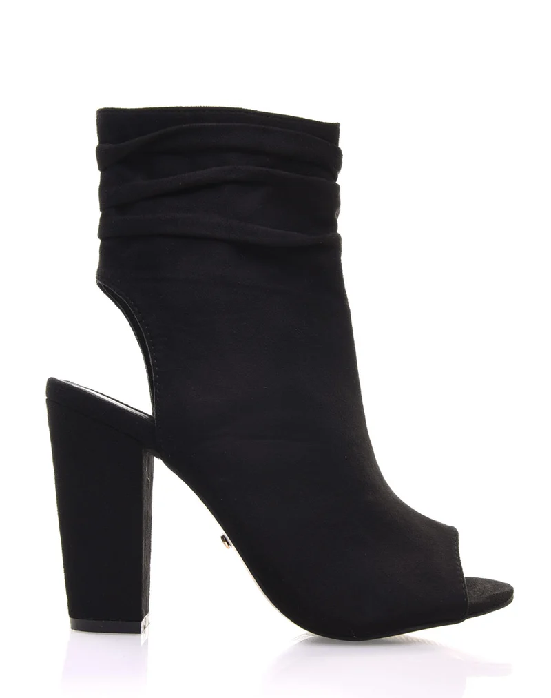Sandales noires en suédine et à talons hauts