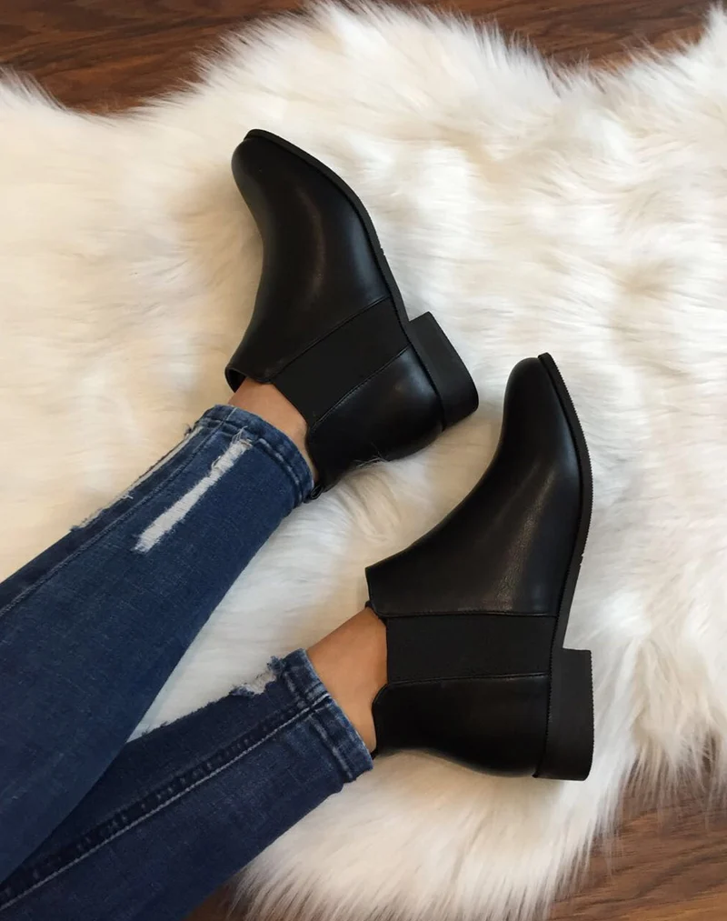 Bottines Chelsea noirs plats