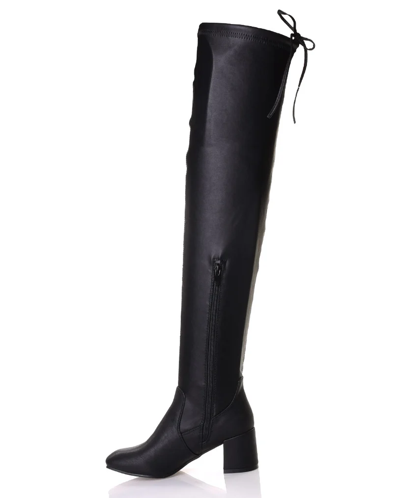 Cuissardes souples noires à talons mi hauts