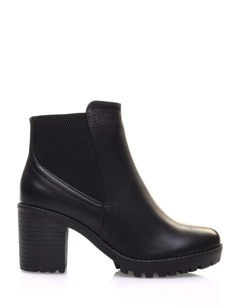 Bottines noires crantées à élastique surpiqué