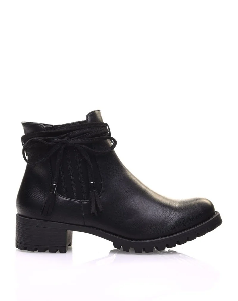 Chelsea boots noires à brides et pompons