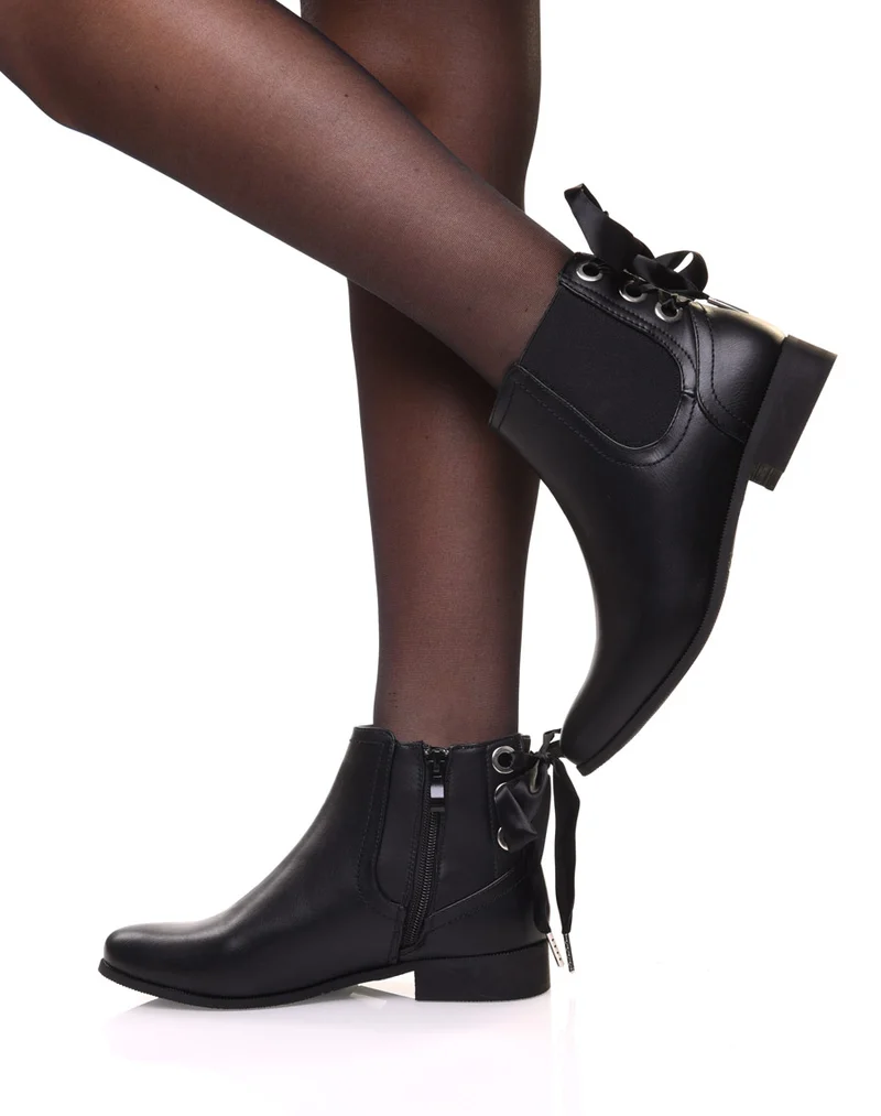 Chelsea boots noires à oeillets et noeud