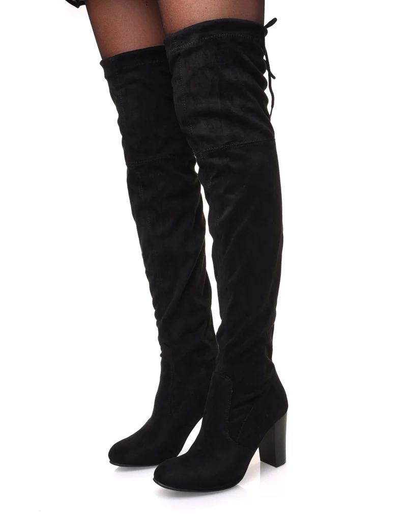 Cuissardes noires ajustables à talons