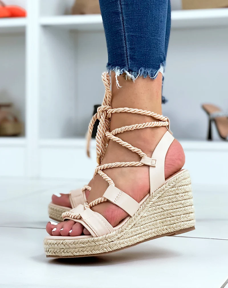 Compensées beiges lacées semelle en toile de jute