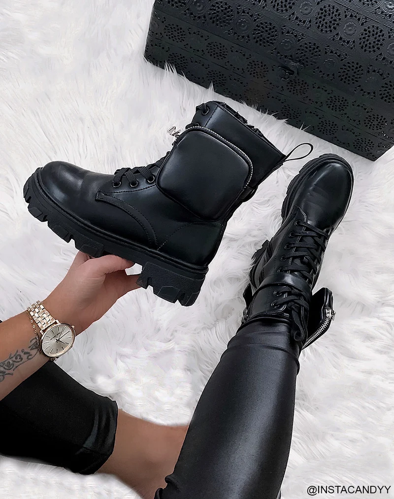 Bottines hautes noires semelle crantée à pochette
