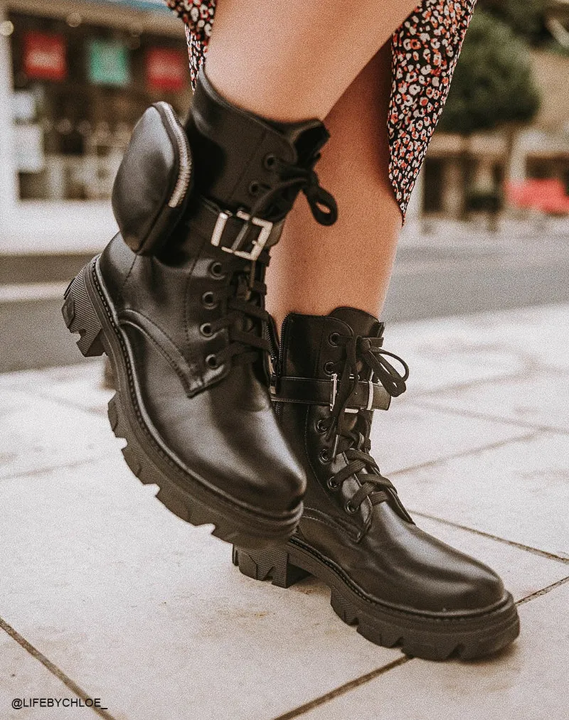 Bottines hautes noires semelle crantée à pochette