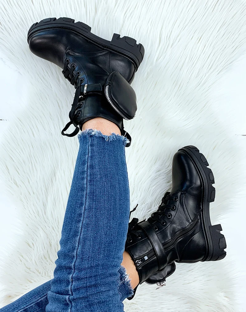 Bottines hautes noires semelle crantée à pochette