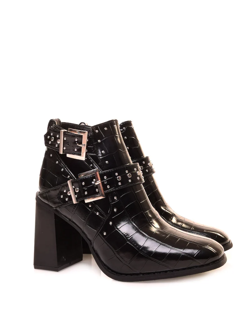 Bottines noires effet croco ajourées à talon et à bout carré