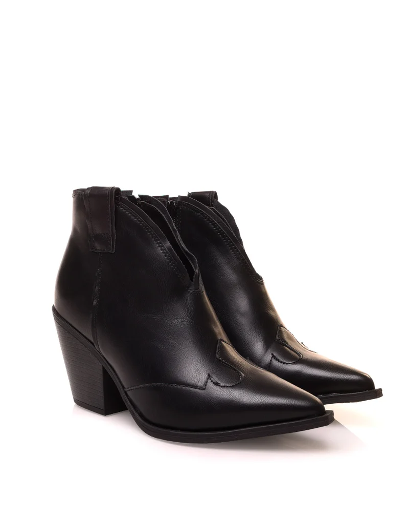 Bottines noires à bout pointu et à talon biseauté