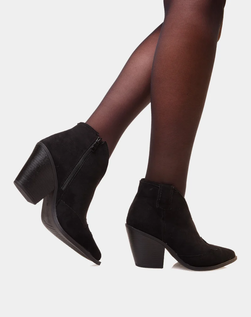 Bottines noires en suédine à bout pointu et à talon biseauté