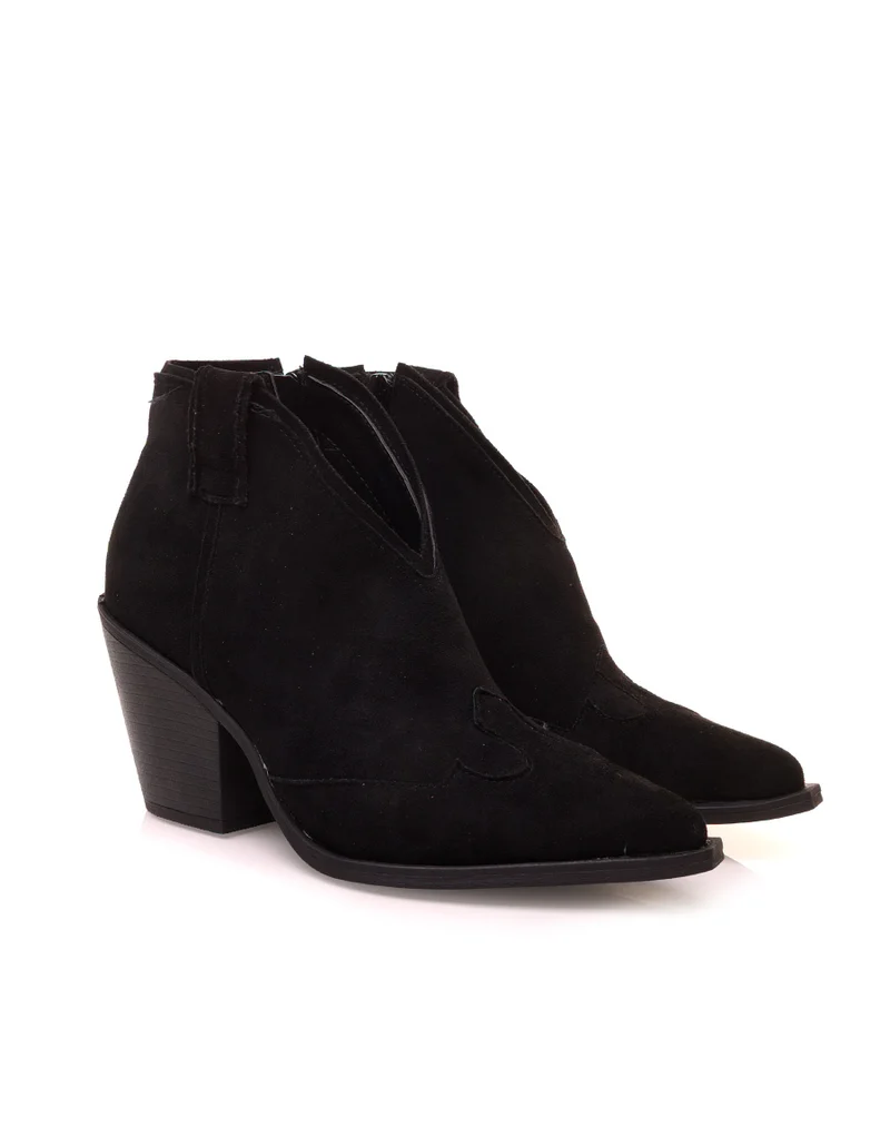 Bottines noires en suédine à bout pointu et à talon biseauté