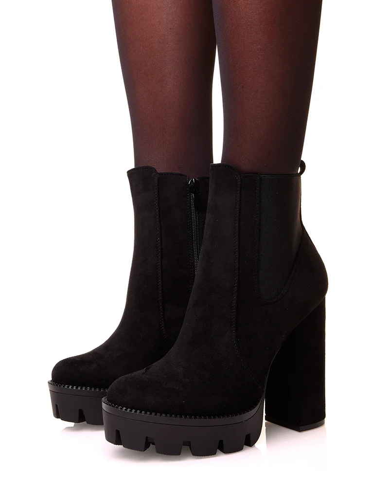 Bottines noires en suédine à talons et plateformes crantées