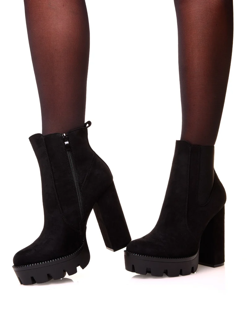 Bottines noires en suédine à talons et plateformes crantées