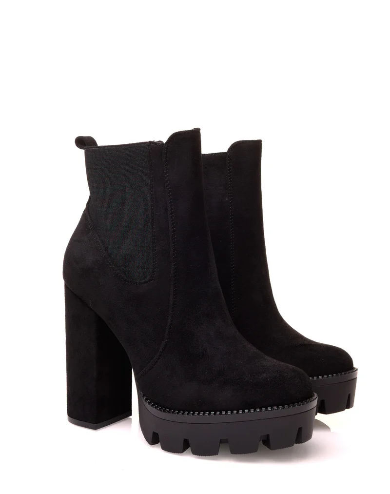 Bottines noires en suédine à talons et plateformes crantées