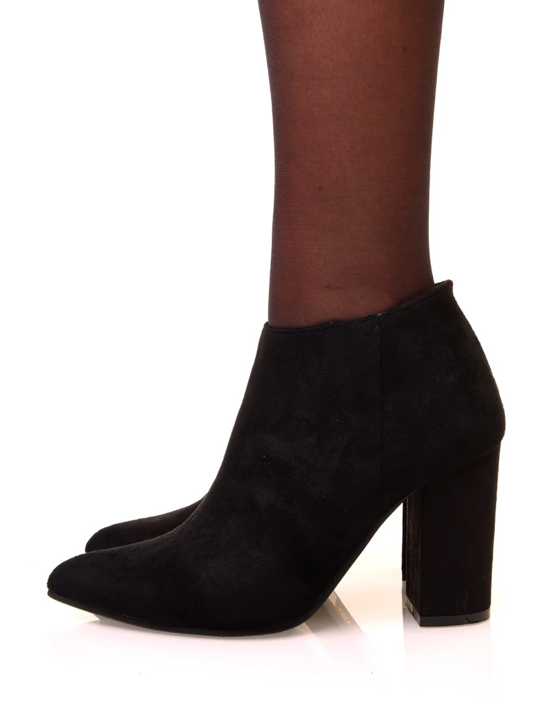 Bottines noires en suédine à talons et à bouts pointus